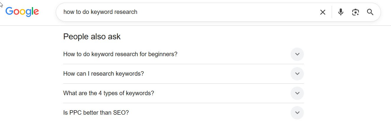 google people also ask box expanded with four related questions for a keyword